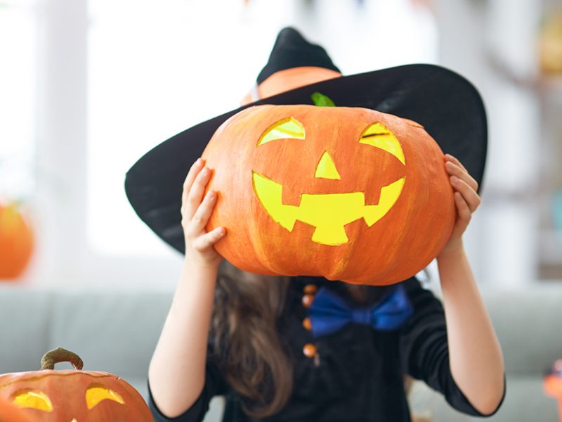 little witch with pumpkin